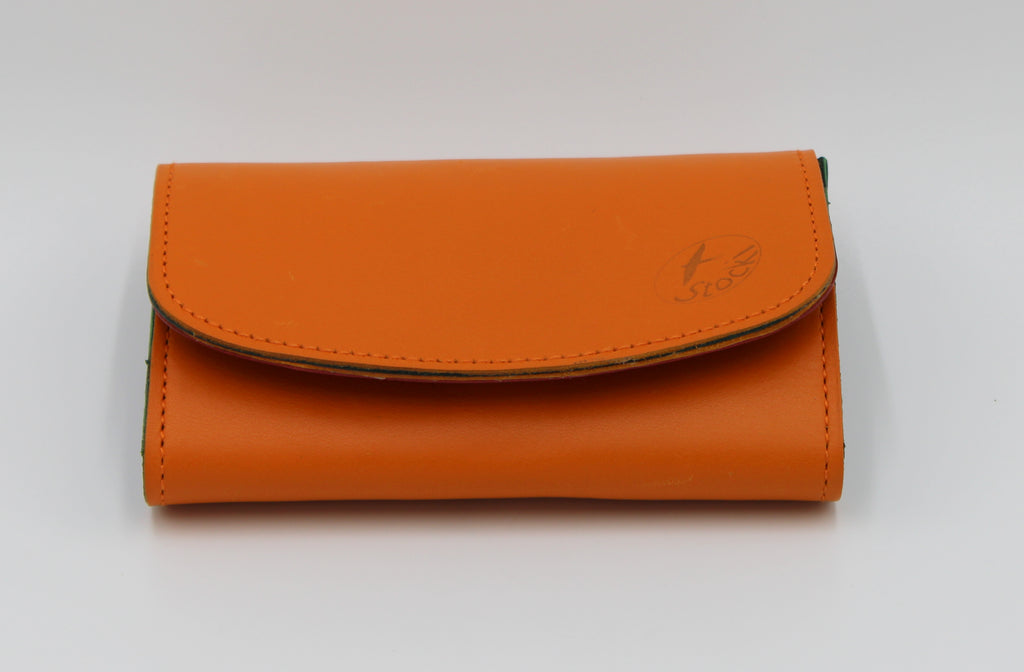 Velino Pocket Portemonnaie aus glattem Rindleder in orange mit farbigem Innenleben, handgefertigt in der Ledermanufaktur Stocker