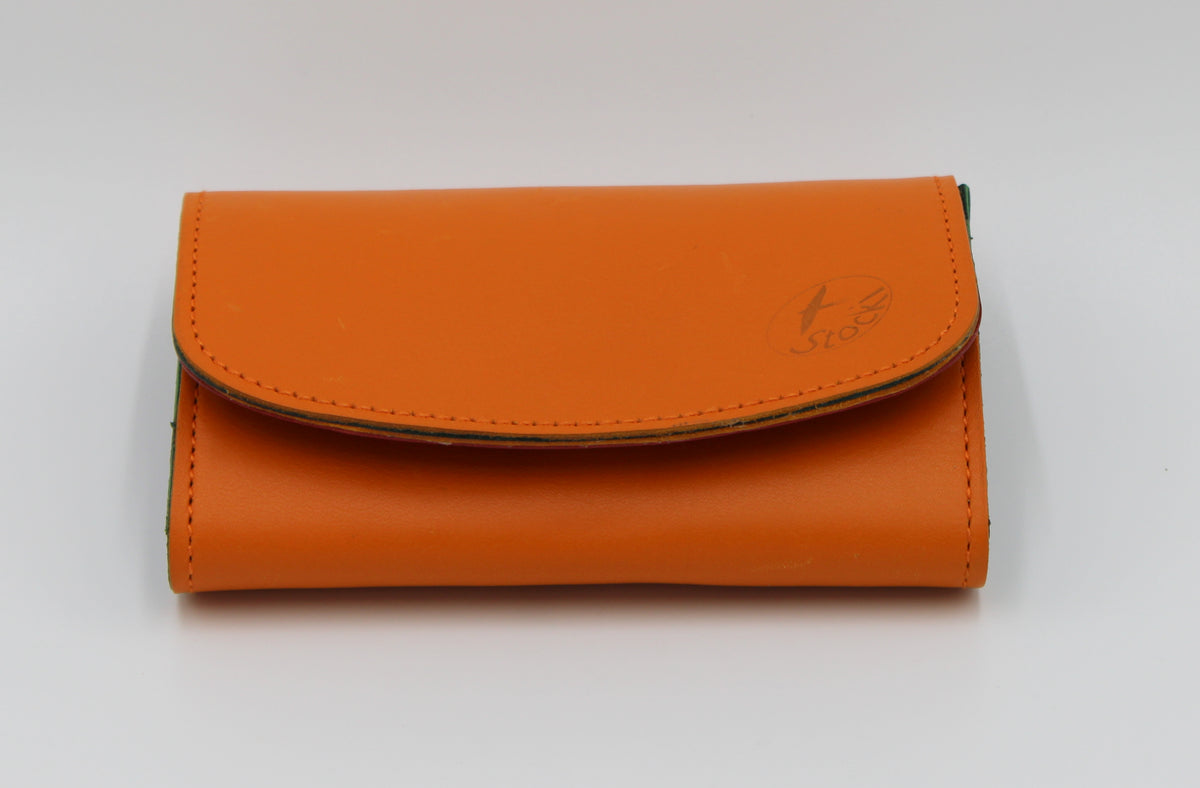 Velino Pocket Portemonnaie aus glattem Rindleder in orange mit farbigem Innenleben, handgefertigt in der Ledermanufaktur Stocker
