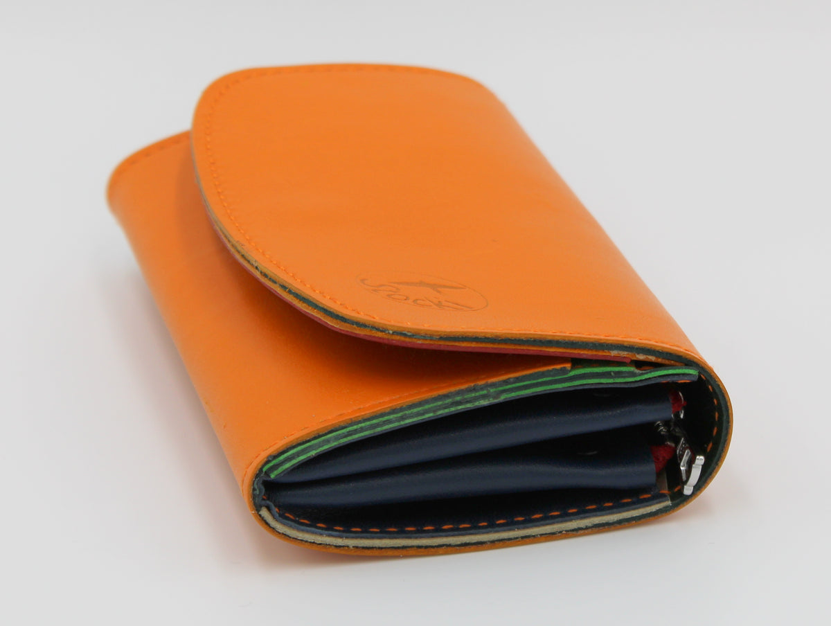 Velino Pocket Portemonnaie aus glattem Rindleder in orange mit farbigem Innenleben, handgefertigt in der Ledermanufaktur Stocker
