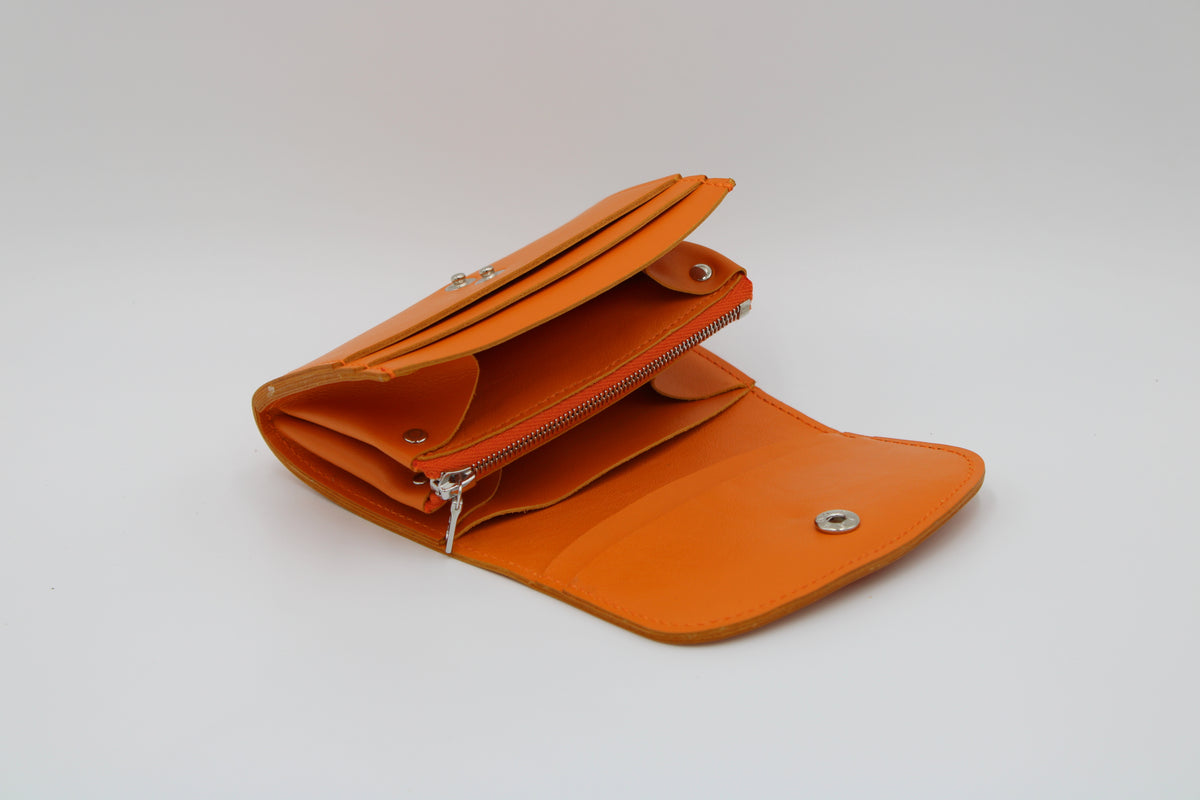 Velino Pocket Portemonnaie aus glattem Rindleder in orange, handgefertigt in der Ledermanufaktur Stocker